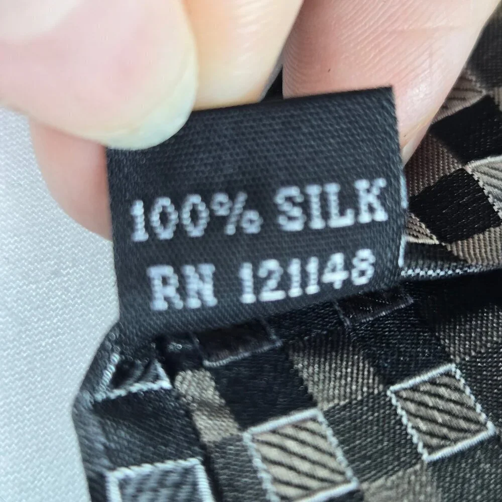 Calvin Klein 100% Silk Men's Tie Black Gray Silver Repeating Diamond Pattern